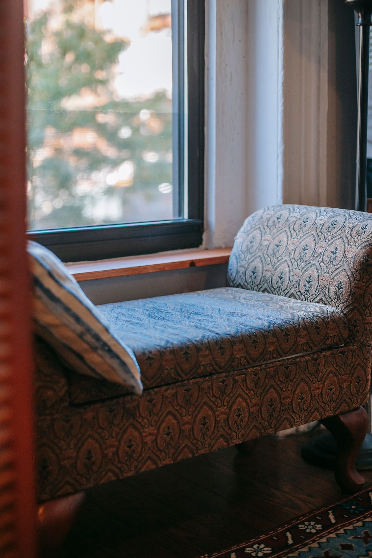 Cozy sofa by a window